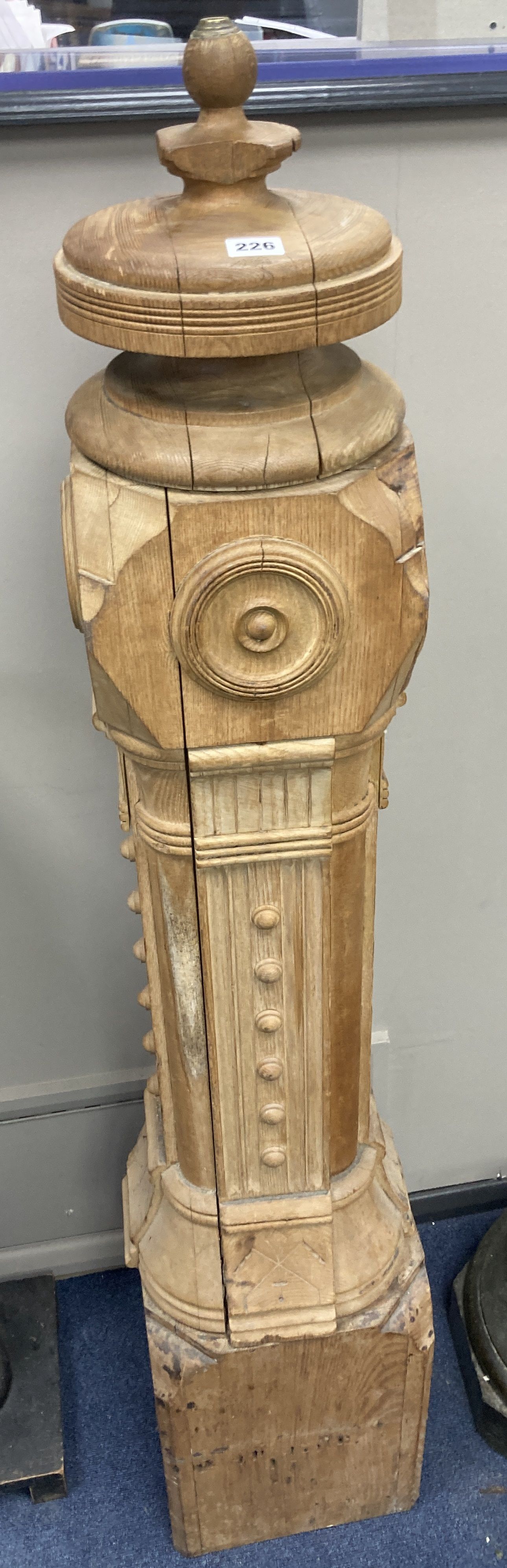 A stripped oak newell post, height 148cm